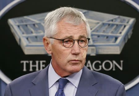 U.S. Secretary of Defense Chuck Hagel speaks at a news briefing to announce reforms to the nuclear enterprise at the Pentagon in Washington, in a November 14, 2014 file photo. Hagel has resigned, a U.S. defense official said on Monday, adding that President Barack Obama had accepted his resignation. REUTERS/Yuri Gripas/files