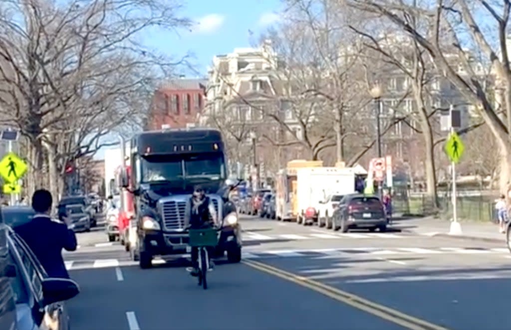 The People’s Convoy trucker protest was reduced to a slow crawl in Washington DC by one man on a bike (Twitter/ShutDownDC)