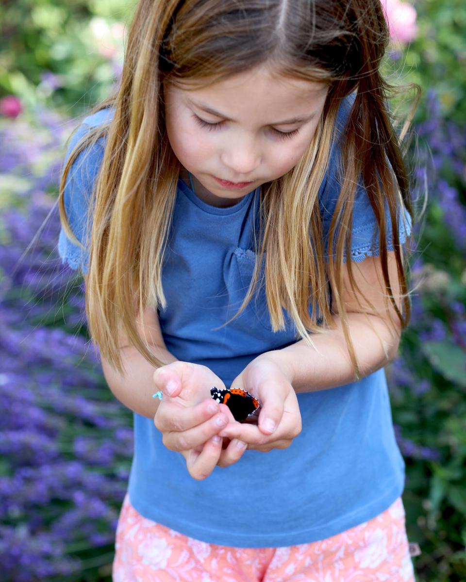 Princess Charlotte holding a butterfly for U.K.'s Butterfly Count Initiative, 2021