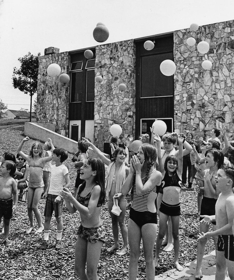 Akron children launch helium balloons containing handwritten notes at Patterson Park Community Center in July 1972. The kids hoped that whoever found the balloons would write back from their faraway locations.