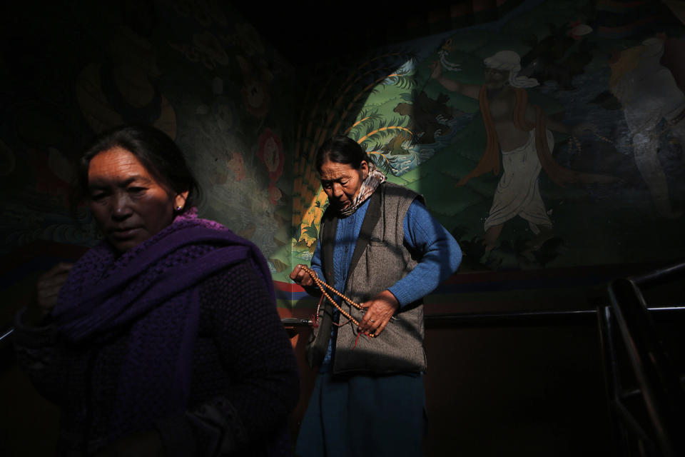 Offering prayers in a monastery in Nepal