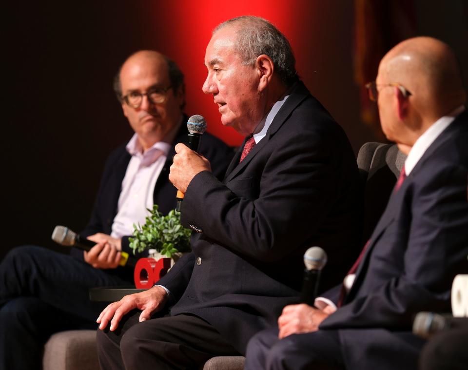 David Grann, left, listens to Osage Principal Chief Geoffrey Standing Bear during a panel discussion. On the right is Chickasaw Governor Bill Anoatubby. Oklahoma Christian University in Edmond hosted several sessions featuring "Killers of the Flower Moon" author David Grann and others on Tuesday.