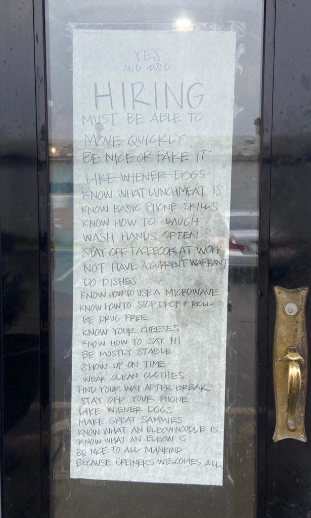 A hiring sign outside of Greiner's Sub Shop in Indianapolis.