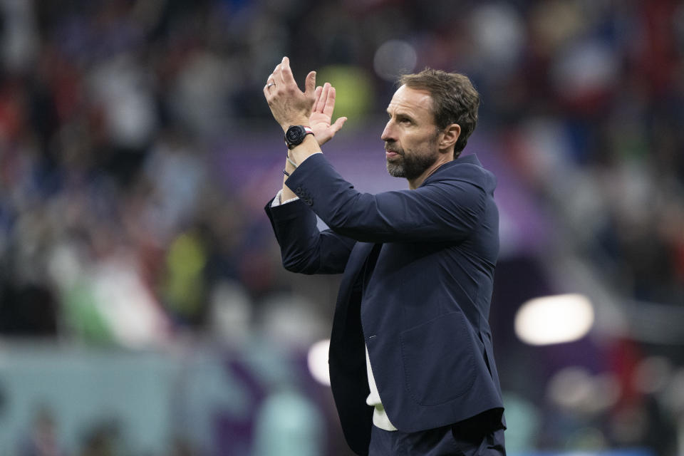 AL KHOR, QATAR - DECEMBER 10: England manager Gareth Southgate applauds the fans at the final whistle  after the FIFA World Cup Qatar 2022 quarter final match between England and France at Al Bayt Stadium on December 10, 2022 in Al Khor, Qatar. (Photo by Sebastian Frej/MB Media/Getty Images)