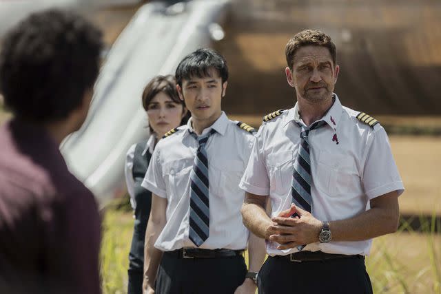 <p>Lionsgate/Moviestore/Shutterstock</p> Gerard Butler (right) in 'Plane,' 2023