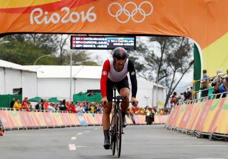 2016 Rio Olympics - Cycling Road - Final - Men's Individual Time Trial - Pontal - Rio de Janeiro, Brazil - 10/08/2016. Fabian Cancellara (SUI) of Switzerland after crossing the finish line. REUTERS/Eric Gaillard