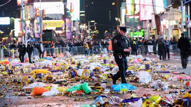 PHOTO: A police officer walks after the first public New Year's event since the COVID-19 pandemic, at Times Square, in New York, Jan. 1, 2023. (Andrew Kelly/Reuters)