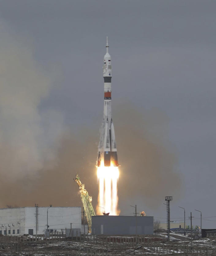 The Soyuz-2.1a rocket booster with Soyuz MS-20 space ship carrying Russian Roscosmos cosmonaut Alexander Misurkin, and spaceflight participants Japanese fashion tycoon Yusaku Maezawa, and Japanese producer Yozo Hirano blasts off at the Russian leased Baikonur cosmodrome, Kazakhstan, Wednesday, Dec. 8, 2021. A Japanese billionaire and his producer rocketed to space Wednesday as the first self-paying space tourists in more than a decade. (Pavel Kassin/Roscosmos Space Agency via AP)