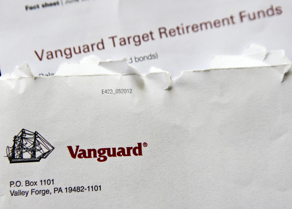 In this June 7, 2018, photo the logo for the Vanguard Group is shown on correspondence in Zelienople, Pa. Vanguard said Monday, July 2, that it will stop charging commissions to trade most of its competitors’ exchange-traded funds. (AP Photo/Keith Srakocic)