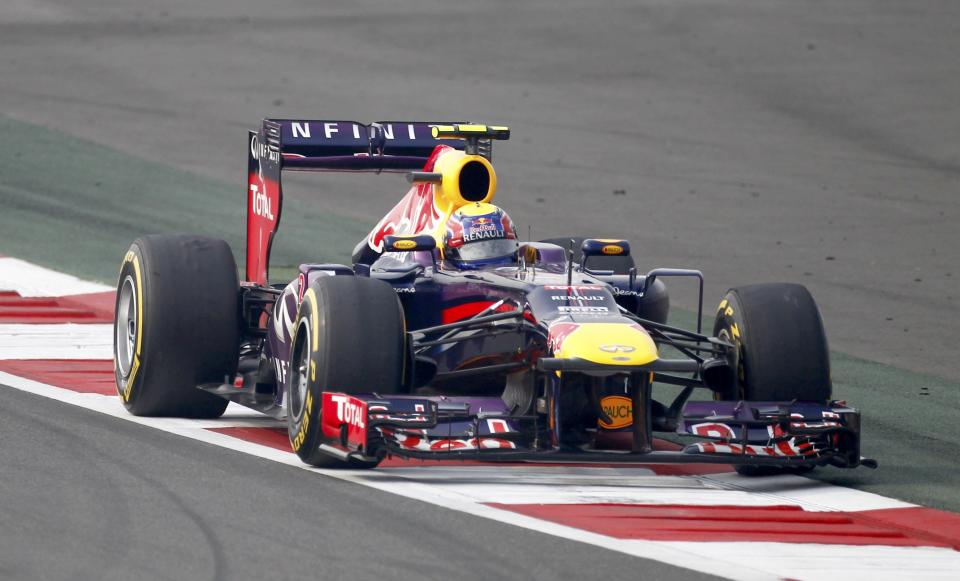 Red Bull Formula One driver Mark Webber of Australia drives during the qualifying session of the Indian F1 Grand Prix at the Buddh International Circuit in Greater Noida, on the outskirts of New Delhi, October 26, 2013. REUTERS/Anindito Mukherjee (INDIA - Tags: SPORT MOTORSPORT F1)