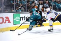 May 19, 2019; San Jose, CA, USA; San Jose Sharks center Gustav Nyquist (14) skates with the puck as St. Louis Blues defenseman Robert Bortuzzo (41) applies pressure during the third period in Game 5 of the Western Conference Final of the 2019 Stanley Cup Playoffs at SAP Center at San Jose. Mandatory Credit: Darren Yamashita-USA TODAY Sports