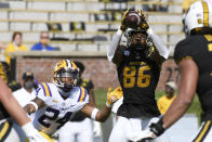 Missouri wide receiver Tauskie Dove (86) catches a pass as LSU cornerback Derek Stingley Jr. (24) defends during the first half of an NCAA college football game Saturday, Oct. 10, 2020, in Columbia, Mo. (AP Photo/L.G. Patterson)