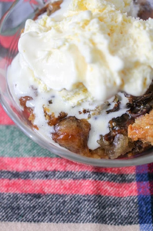 <p><a href="https://mooreorlesscooking.com/slow-cooker-caramel-apple-dump-cake/" rel="nofollow noopener" target="_blank" data-ylk="slk:Moore or Less Cooking;elm:context_link;itc:0;sec:content-canvas" class="link ">Moore or Less Cooking</a></p>