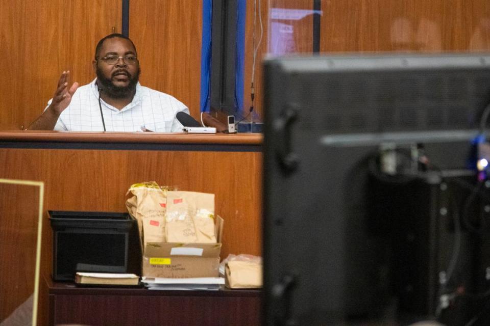 Osharmar Williams describes a customer who tried to sell him a cellphone at his store in the trial of Nathaniel Rowland at the Richland County Courthouse on Thursday, July 22, 2021. Later in his testimony he identified Rowland at the person who tried to sell him the phone.