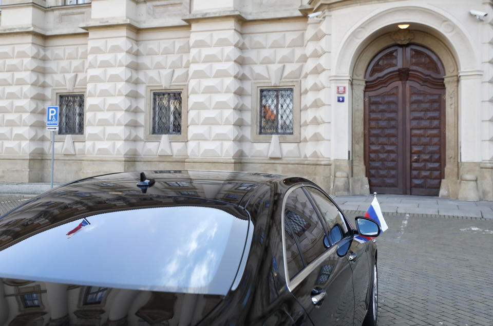 Car of Russia's ambassador to Prague, Aleksandr Zmeyevsky is parked in front of the Foreign Ministry in Prague, Czech Republic, Wednesday, April 21, 2021. The ambassador was summoned by newly appointed Foreign Minister Kulhanek to be handed the Czech protest against the Russian expulsion move, which the Czechs consider disproportionate, saying it has paralyzed the Czech Embassy in Moscow following the fierce diplomatic crisis over allegations that Russian agents were involved in a massive Czech ammunition depot explosion. (AP Photo/Petr David Josek)