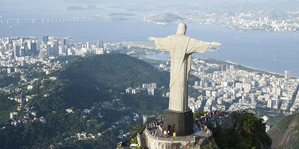 <b>Visit the Christ the Redeemer Statue </b> If you’ve ever opened a book or watched a travel show on TV, chances are you’re already familiar with Christ the Redeemer. The colossal statue, perched overlooking the city of Rio de Janeiro, was completed in October 1931 and held the title of the world’s largest statue of Christ for 69 years until it was overtaken by one in Poland.