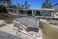 <p>Remnants of a three-story, 12-unit condominium near Islamorada, along the Overseas Highway in the Florida Keys, on Sept. 12, 2017. The building collapsed during the storm surge caused by Hurricane Irma. (Photo: Al Diaz/Miami Herald/TNS via Getty Images) </p>