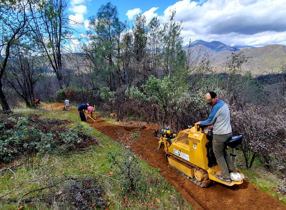 Redding Trail Alliance volunteers help cut mountain bike trails in the greater Redding area.