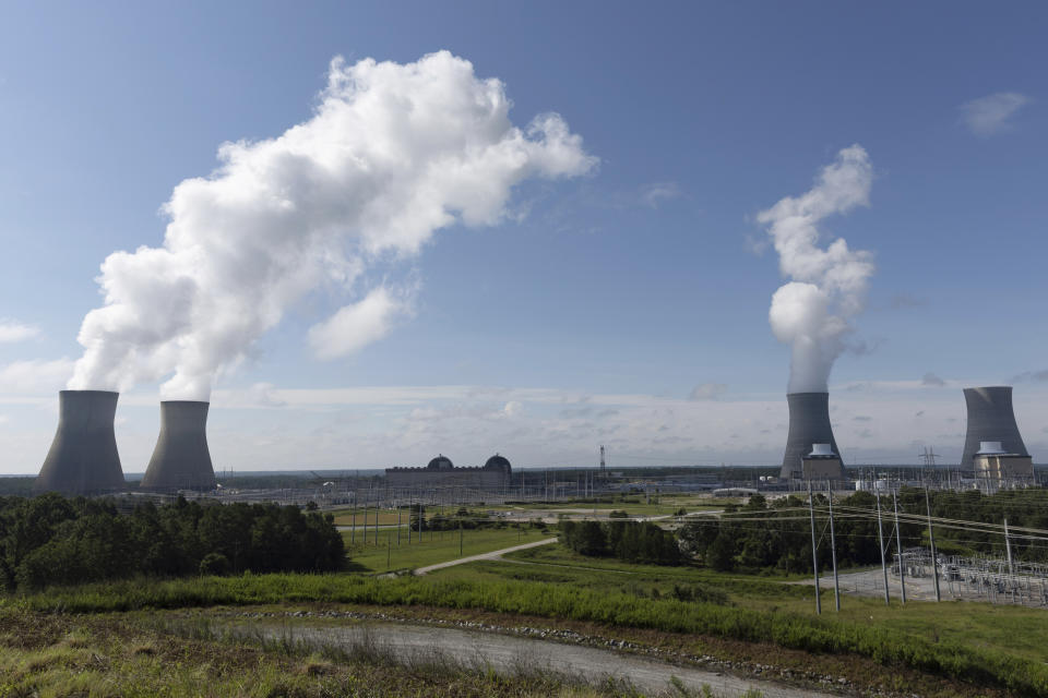 Views of units, from left, and cooling towers 1-4 at Plant Vogtle, in Burke County near Waynesboro, Ga., on Monday, July 31, 2023. Georgia Power Co. announced Monday that Unit 3 at Plant Vogtle, southeast of Augusta, has completed testing and is now sending power to the grid reliably. It's the first new American reactor built from scratch in decades. (Arvin Temkar/Atlanta Journal-Constitution via AP)