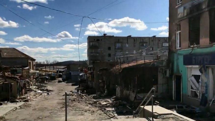 A heavily damaged street in the previously occupied eastern Ukrainian city of Kupyansk, about six miles from the front line and Russia's invading forces, is seen in the spring of 2023. / Credit: CBS News