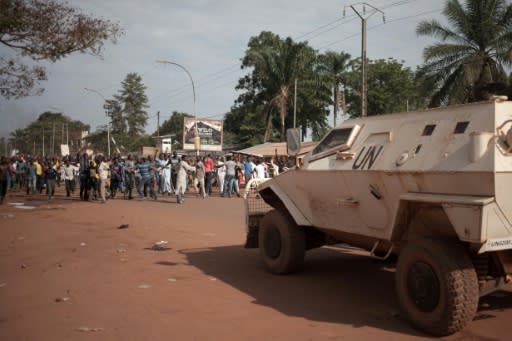 Residents of a Muslim district in Bangui protest on April 11 in front of the UN mission base. They laid out the bodies of 17 men who they claimed were killed by Blue Helmets