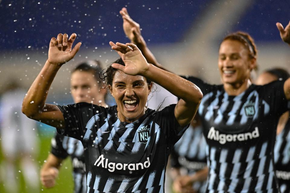 USWNT player Lynn Williams celebrates with NWSL teammates after scoring a goal for Gotham FC against the North Carolina Courage at Red Bull Arena.  Gotham FC won the game, 1-0.