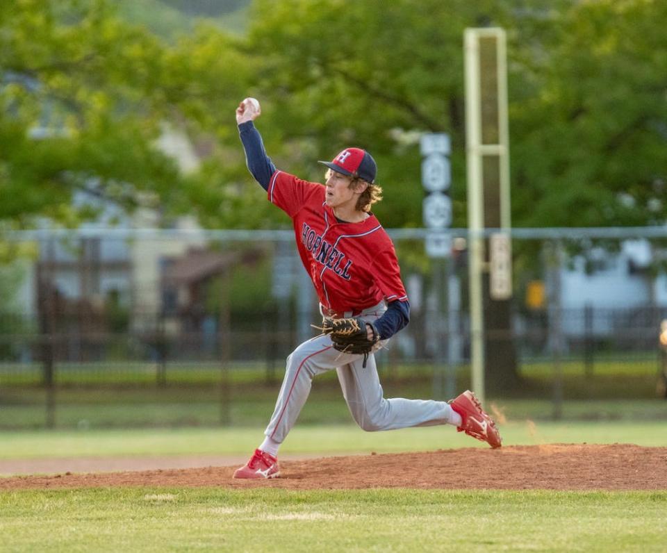 Hornell starting pitcher Andrew Davis drives a pitch to the plate Wednesday evening as the Red Raiders completed a comeback walk-off win over the Waterloo Tigers 6-5 to advance to the Section V finals Saturday afternoon. Davis finished the game with seven strikeouts in a complete game effort.