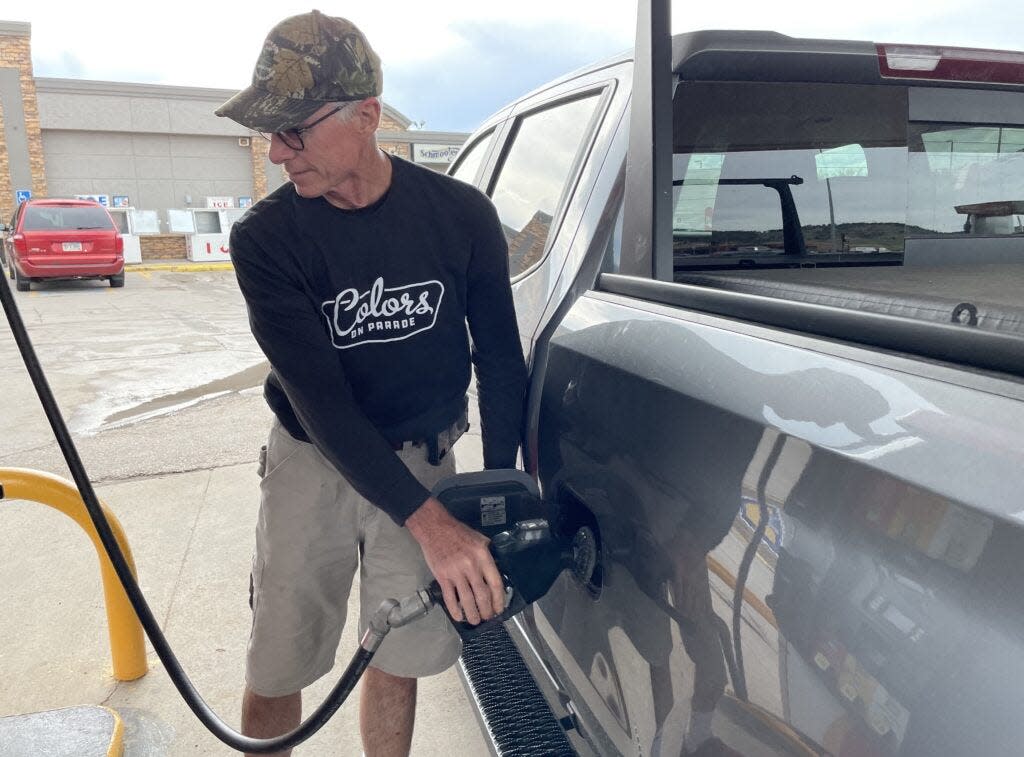 A recent fill-up in Rapid City cost Wisconsin tourist Duane Johnson nearly $100, but the high price of gas has not prevented Johnson and his wife from taking a vacation this year.