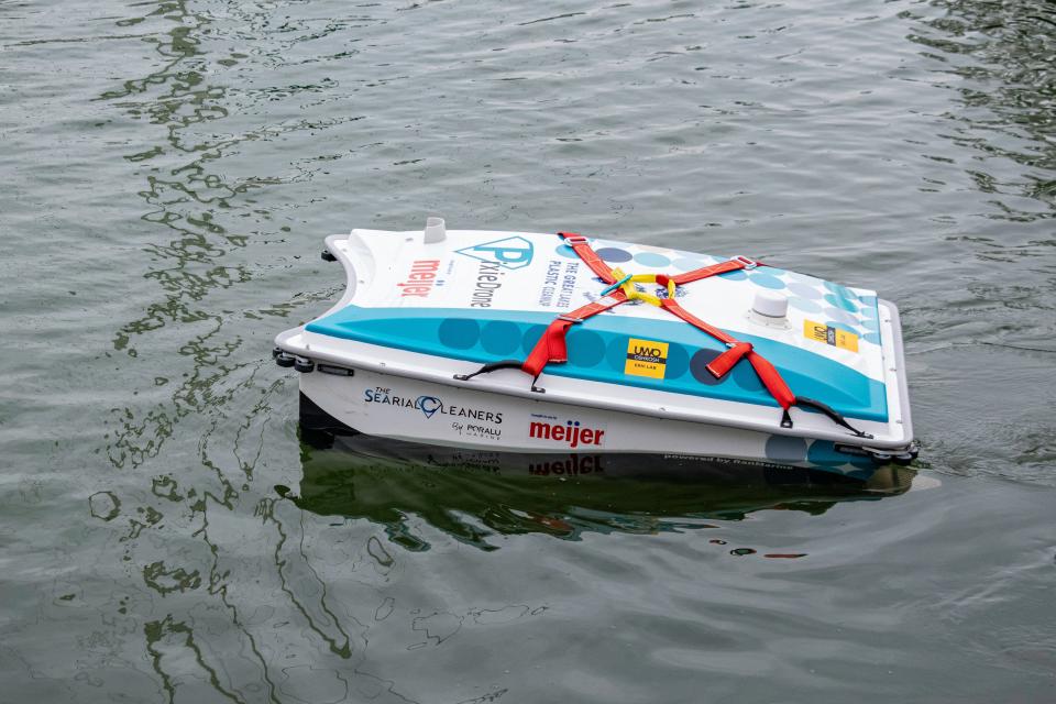 A Pixie Drone skims the water and picks up floating trash in the Manitowoc Marina on July 12. Pixie Drones are one of the many kinds of technology being used to clean up plastic pollution in Lake Michigan.