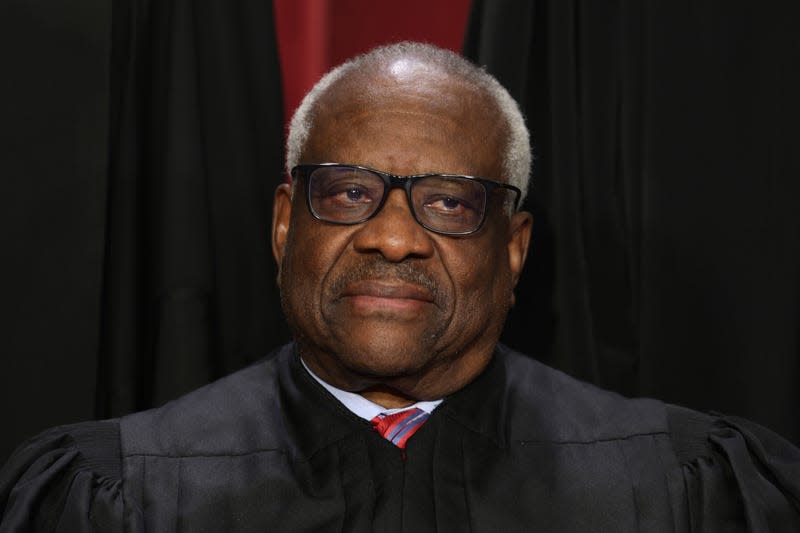 WASHINGTON, DC - OCTOBER 07: United States Supreme Court Associate Justice Clarence Thomas poses for an official portrait at the East Conference Room of the Supreme Court building on October 7, 2022 in Washington, DC