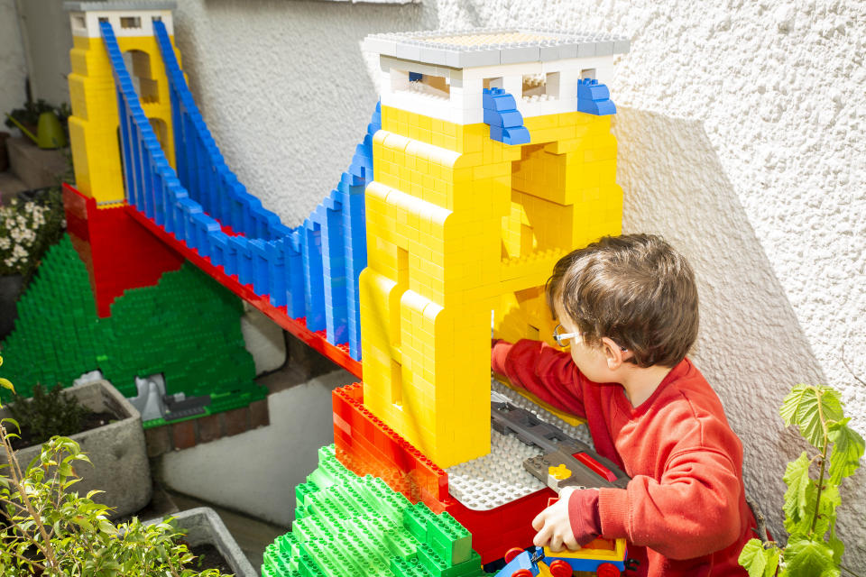 John Ford built a huge Duplo train track for his two sons to play with during lockdown (SWNS)