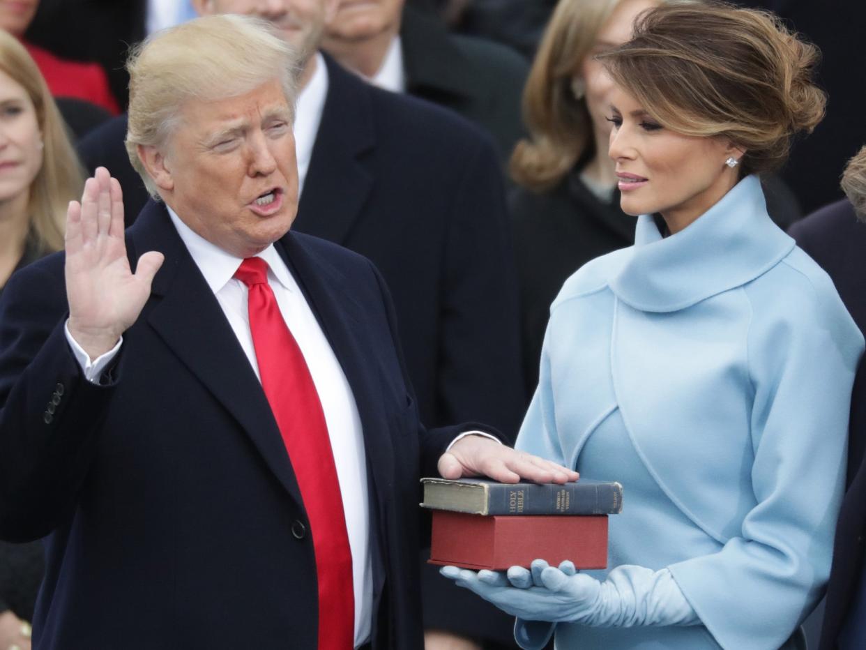 <p>Donald Trump’s inauguration on 20 January, 2017, was attended by his defeated rival Hillary Clinton and all living former presidents. He is weighing up whether to extend the same courtesy to Joe Biden.</p> (Getty)