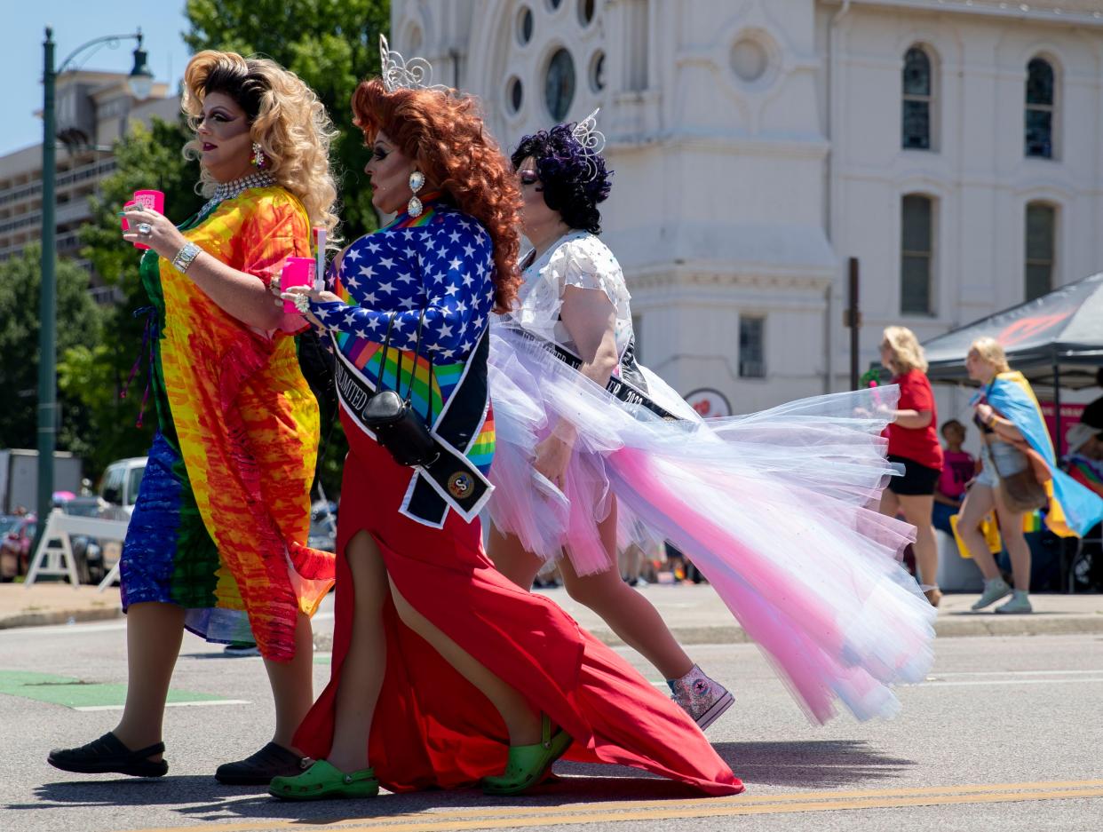 Drag queens walk to their spot in the parade lineup before the Memphis Pride Parade on Saturday in Memphis, Tennessee.