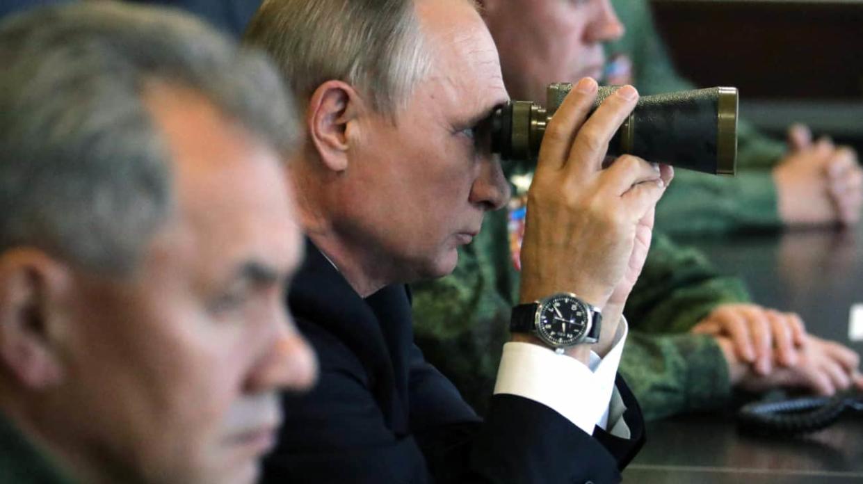 Russian President Vladimir Putin and his Defence Minister Sergei Shoigu. Photo: Getty Images