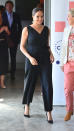 For the event, the Duchess changed into her second look of the day: a £100 <a href="https://fave.co/2l5lK2b" rel="noopener" target="_blank" data-ylk="slk:black jumpsuit by US label Everlane;elm:context_link;itc:0;sec:content-canvas" class="link ">black jumpsuit by US label Everlane</a>, which she was previously seen wearing in a behind-the-scenes video posted to celebrate her involvement in the September 2019 issue of British Vogue. <a href="https://fave.co/2l5lK2b" rel="noopener" target="_blank" data-ylk="slk:Shop now.;elm:context_link;itc:0;sec:content-canvas" class="link "><strong>Shop now.</strong></a> <em>[Photo: Getty]</em>