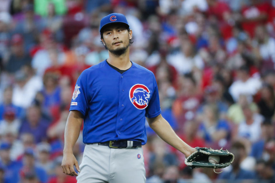 Chicago Cubs starting pitcher Yu Darvish reacts after giving up a two-run home run to Cincinnati Reds' Aristides Aquino in the second inning of a baseball game, Friday, Aug. 9, 2019, in Cincinnati. (AP Photo/John Minchillo)