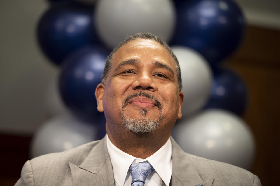 New Georgetown NCAA college basketball head coach Ed Cooley smiles during an introductory press conference in Washington, Wednesday, March 22, 2023. (AP Photo/Cliff Owen)