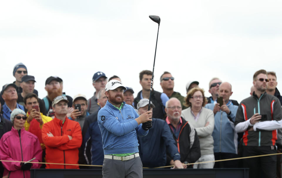 J.B. Holmes of the United States lines up his tee shot on the 14th during the second round of the British Open Golf Championships at Royal Portrush in Northern Ireland, Friday, July 19, 2019.(AP Photo/Jon Super)