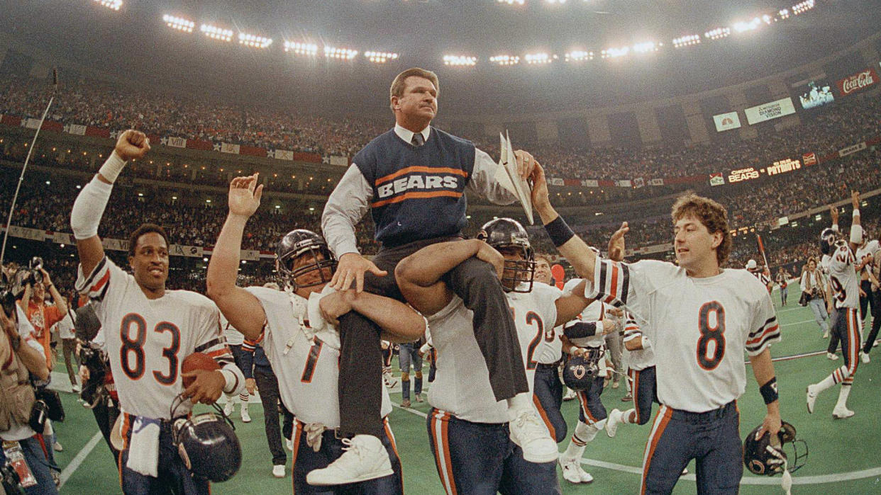 Mandatory Credit: Photo by Phil Sandlin/AP/Shutterstock (6577875a)MIKE DITKA Chicago Bears head coach Mike Ditka is carried off the field by Steve McMichael, left, and William Perry after the Bears win Super Bowl XX in New Orleans, La.