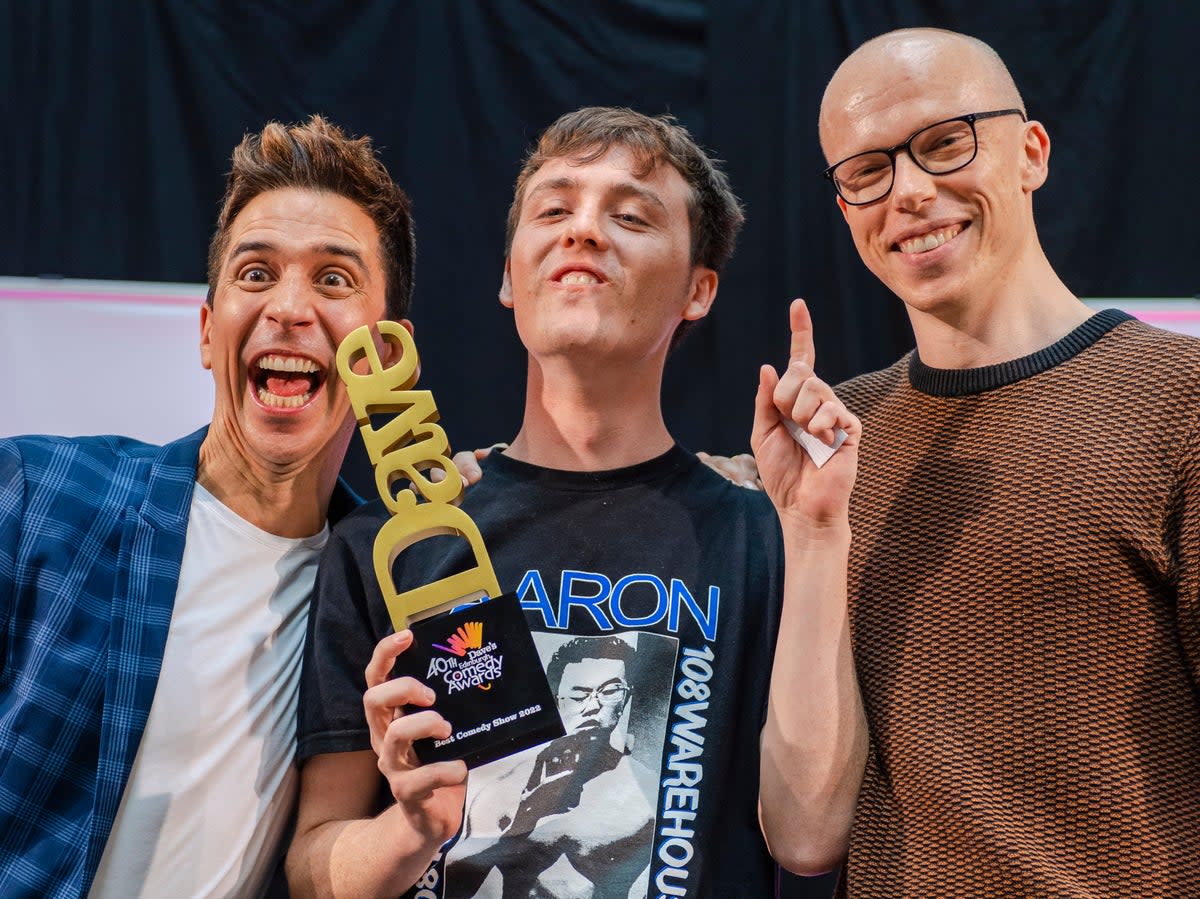 2022 Best Comedy Show winner Sam Campbell (centre) with previous winners Russell Kane (left) and Jordan Brookes (Getty Images)