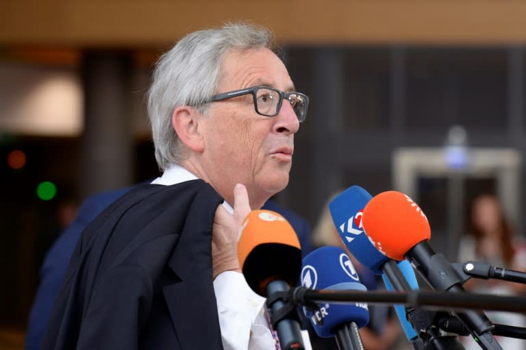 European Commission chief Jean-Claude Juncker speaks to journalists on the second day of a summit of European Union leaders in Brussels on June 23, 2017