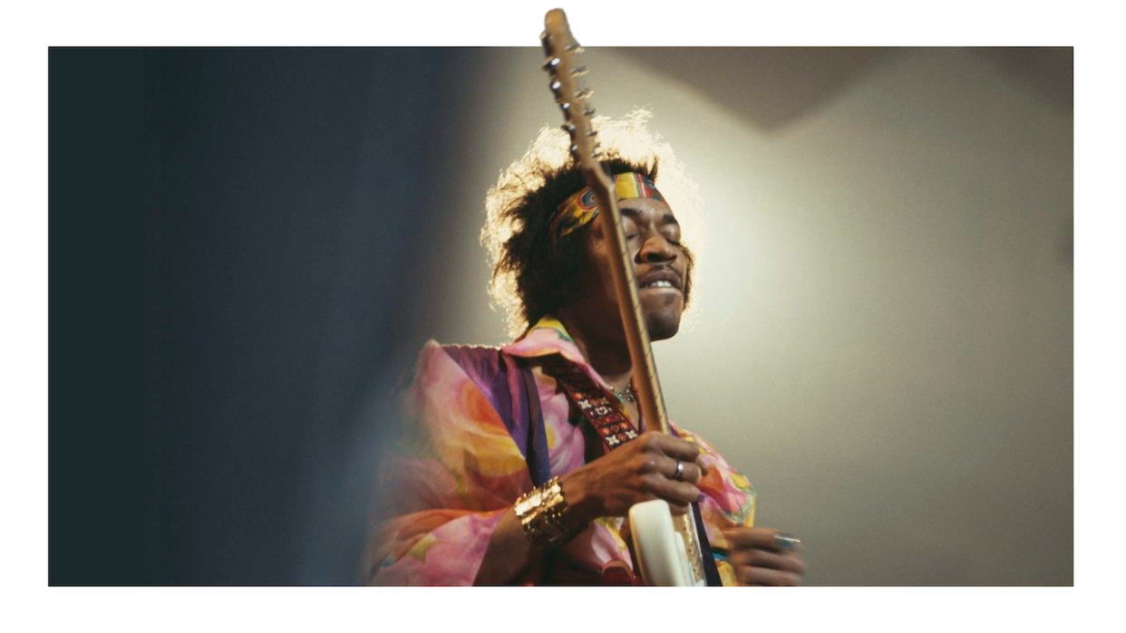  American rock guitarist and singer Jimi Hendrix (1942-1970) performs live on stage playing a white Fender Stratocaster guitar with The Jimi Hendrix Experience at the Royal Albert Hall in London on 24th February 1969. Image is part of David Redfern Premium Collection. . 