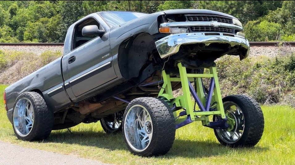 You Could Buy This Chevy Silverado Squat Truck With a 42-Inch Lift, But Please Don’t photo