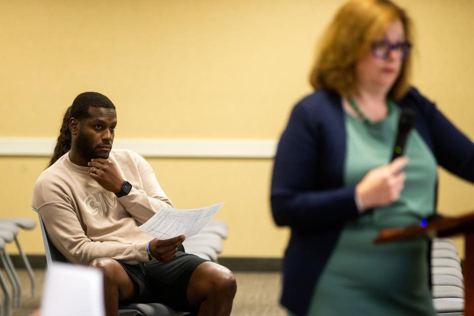 Larry Jackson, petition filer for the recall of Ottawa County Commissioner Lucy Ebel, listens during a petition language hearing Monday, July 17, 2023.