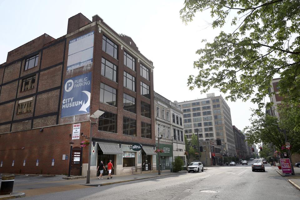 The building at 1409 Washington Ave., is seen, where 10 teens were shot overnight, one fatally, during a party on the fifth floor of the building in downtown St. Louis, Sunday, June 18, 2023. (David Carson/St. Louis Post-Dispatch via AP)