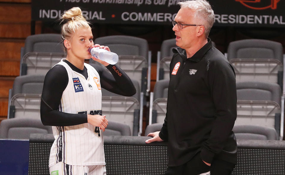 Shane Heal and daughter Shyla, pictured here during a Sydney Flames game in 2022.