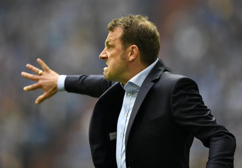 Schalke's head coach Markus Weinzierl reacts during the German Bundesliga soccer match between FC Schalke 04 and VfL Wolfsburg in Gelsenkirchen, Germany, Saturday, April 8, 2017. (AP Photo/Martin Meissner)