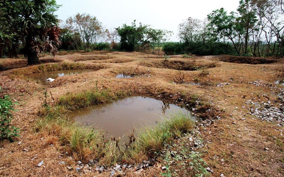 Mass graves at the Choeung Ek "Killing Fields" - GETTY IMAGES