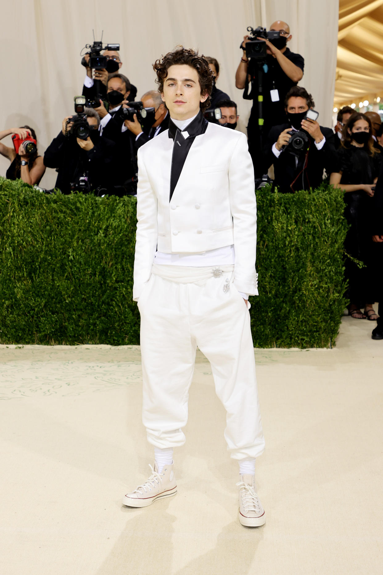 Timothée Chalamet opted for a monochrom look, and in keeping with the theme of this year's Met Gala 'In America: A Lexicon Of Fashion' he completed the look with iconic Chuck Taylor Converse.  (Getty Images)