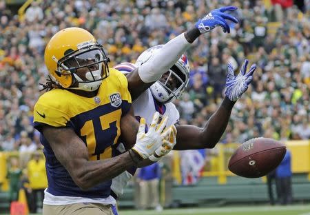 Sep 30, 2018; Green Bay, WI, USA; Green Bay Packers wide receiver Davante Adams (17) drops a pass in the end zone as Buffalo Bills cornerback Tre'Davious White (27) defends during the first half at Lambeau Field. Mandatory Credit: Dan Powers/Wisconsin via USA TODAY NETWORK